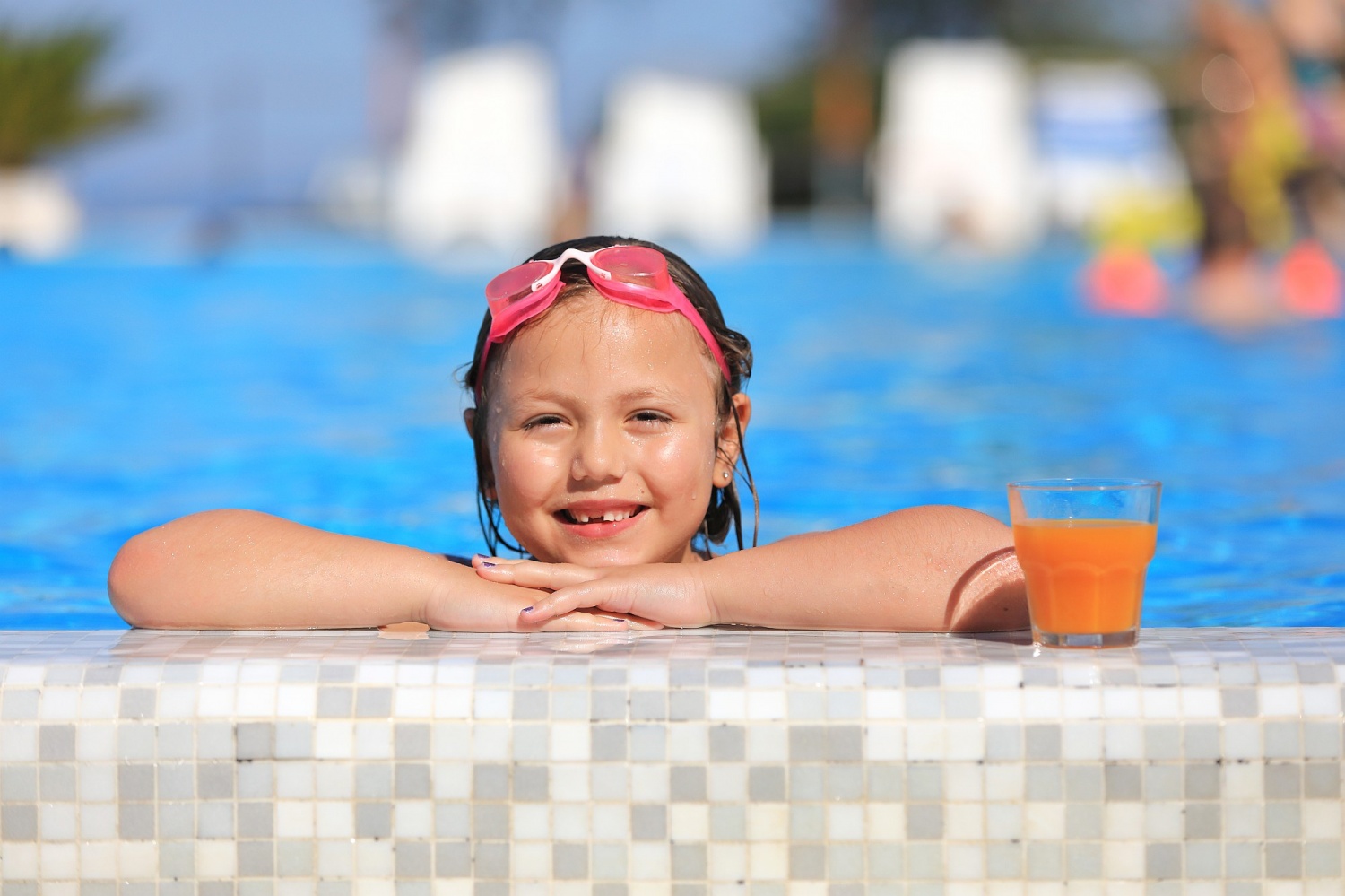 Enjoying the swimming pools on a family holiday